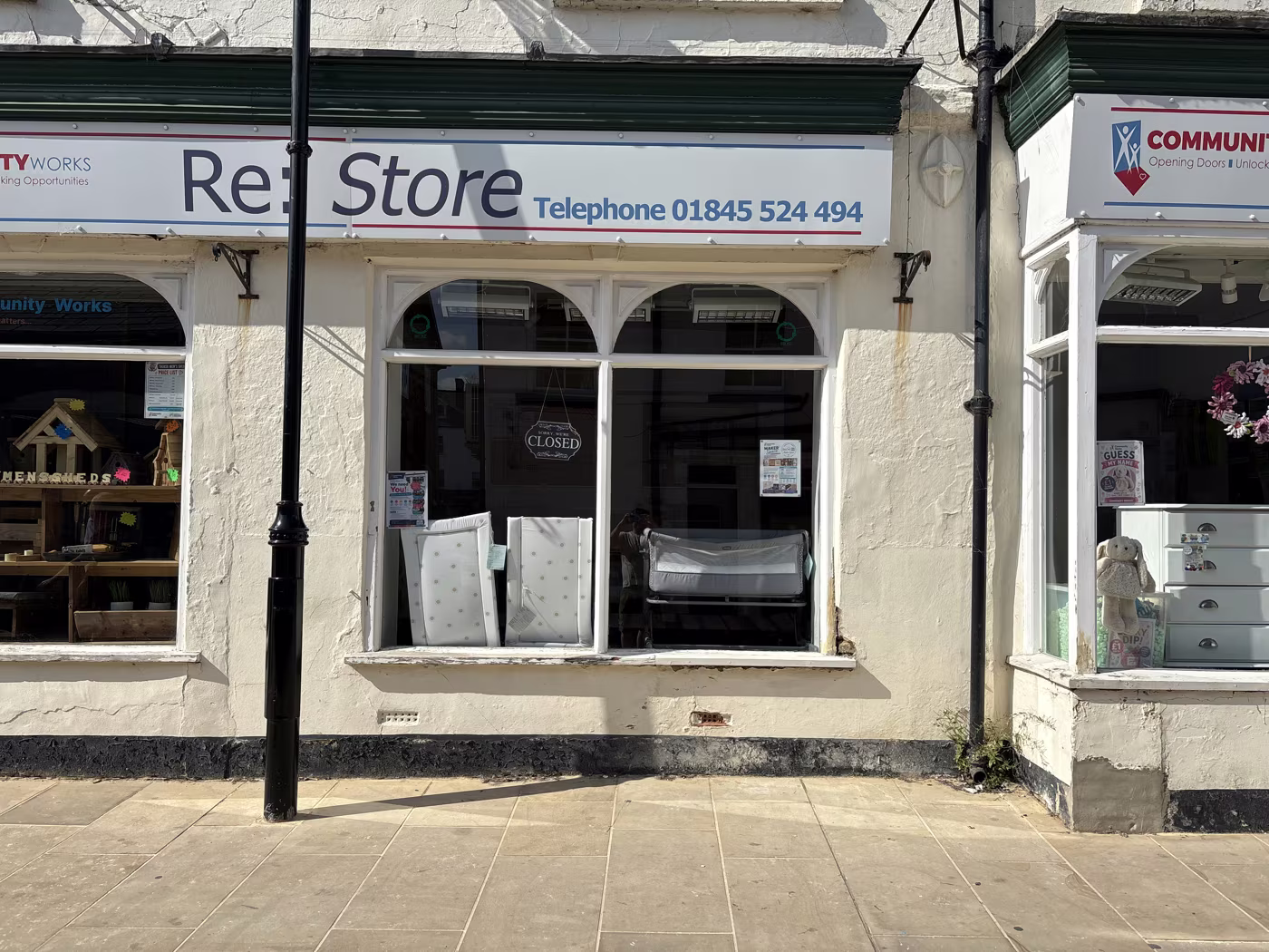 The Re:Store furniture shop run by Community Works, its arched windows showing furniture inside